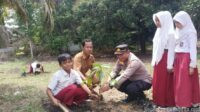 Subsektor Kepolisian Pelalawan Gelar Tanam Sejuta Pohon Bersama SDN 014 Delik