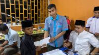 JamkesWatch Pelalawan Serahkan Santunan Anak Yatim dalam rangka Buka Bersama FSPMI Pelalawan