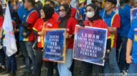 Ketika Si Merah dan Si Biru, Dua Kompetitor Bersatu Melawan Ketidakadilan Pengusaha