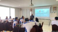 Aruna Salam Jabarkan Filosofi Kepalan Tangan Buruh